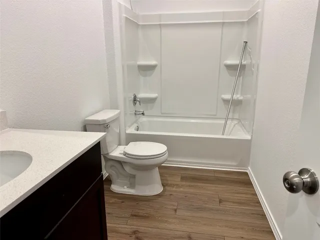 a view of a room that has a window in it