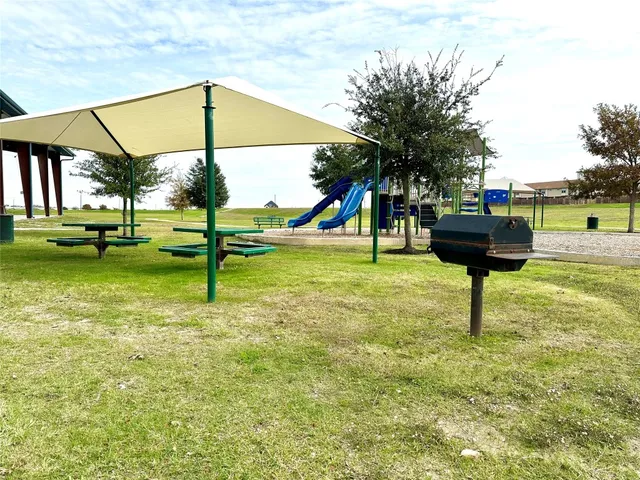 a view of a park with slide