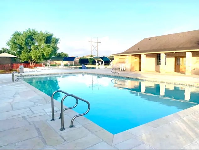 a view of a house with a swimming pool