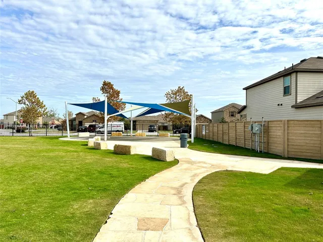 a view of a terrace with chairs