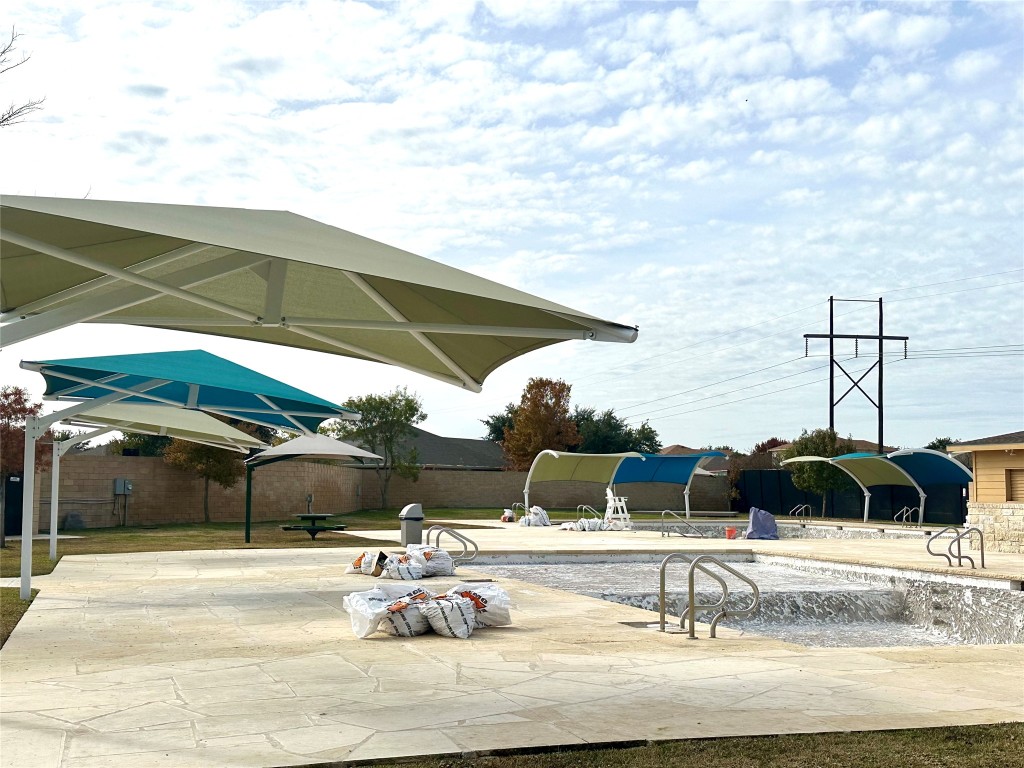 345 The Bad Way Jarrell, TX 76537 - Photo 29 of 34 a view of a terrace with chairs