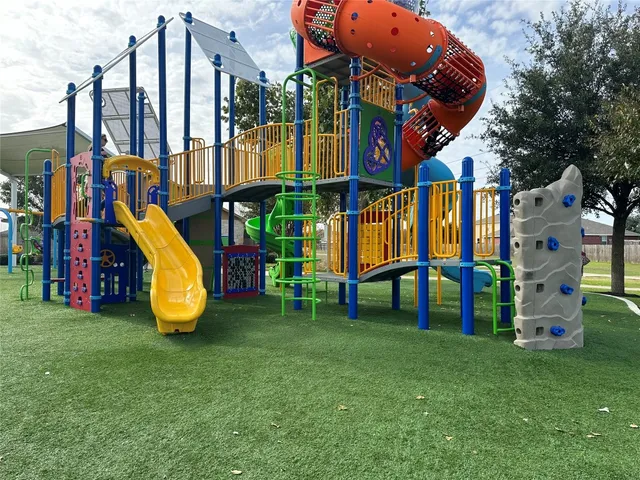 a view of a swimming pool with a lounge chairs