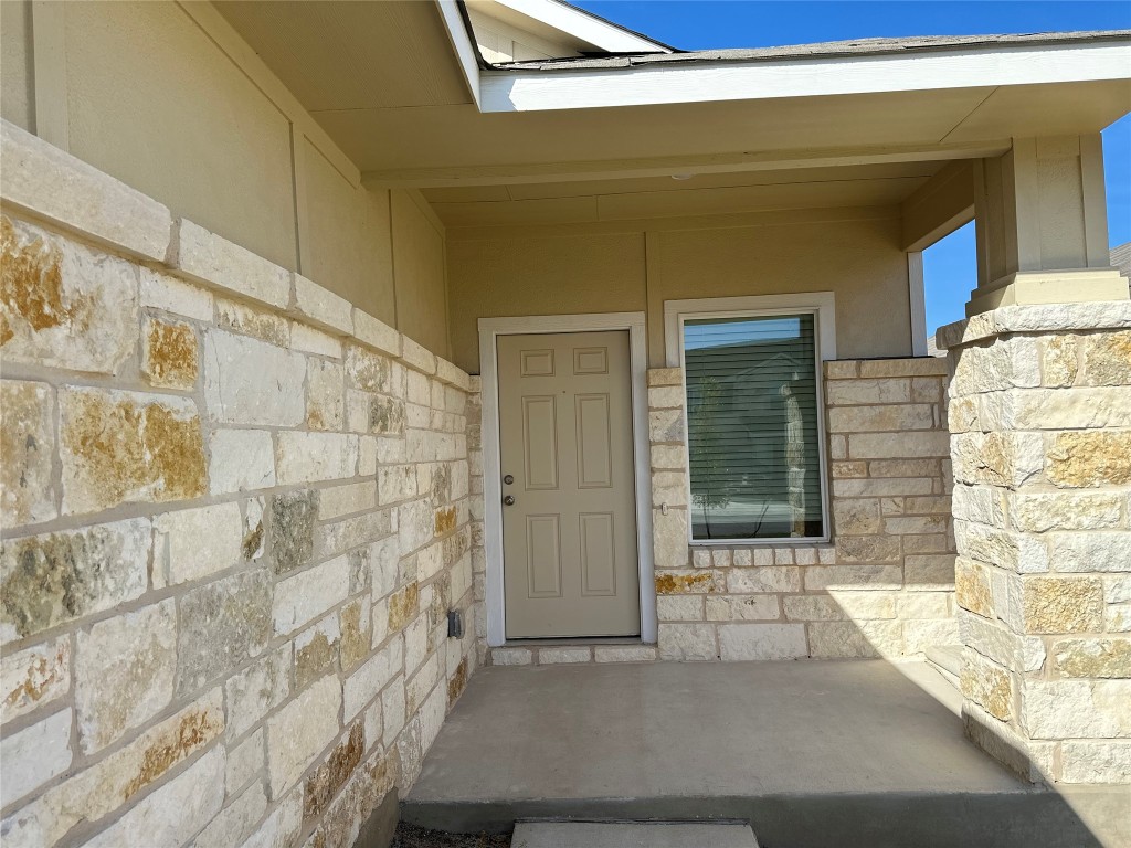 345 The Bad Way Jarrell, TX 76537 - Photo 4 of 34 a view of wooden door