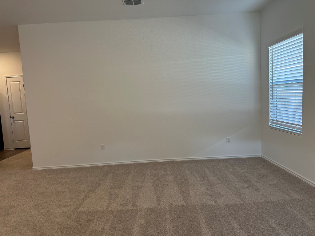 345 The Bad Way Jarrell, TX 76537 - Photo 5 of 34 a view of an empty room