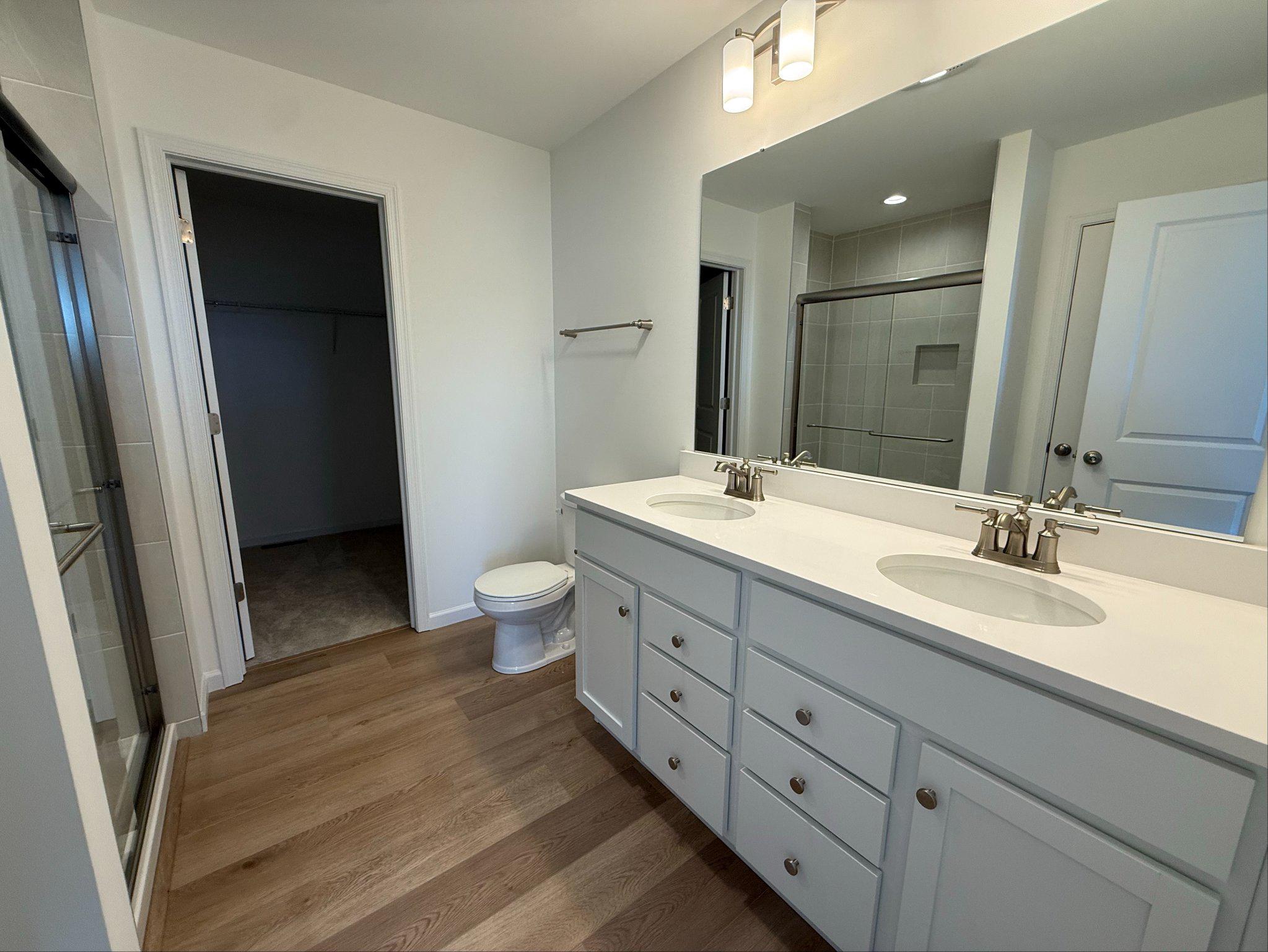 126 Redbud Road Bellefonte, PA 16823 - Photo 12 of 19 Owners bathroom with dual sinks & tiled shower