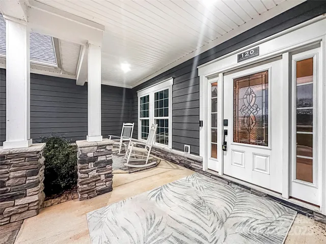 a view of a balcony with couch