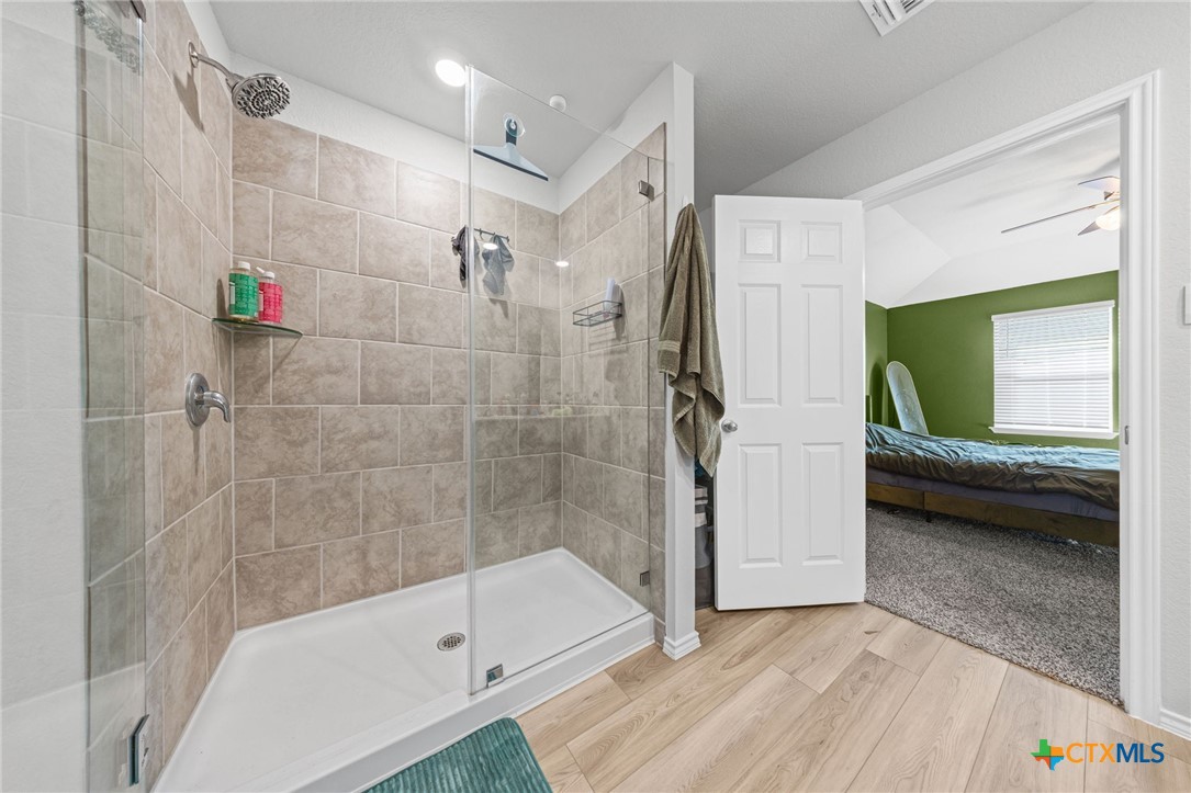 7203 Gilbert Drive Killeen, TX 76549 - Photo 13 of 16 a bathroom with a tub and a shower