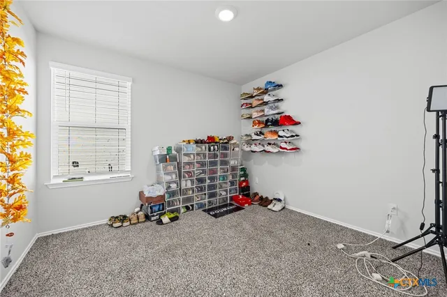 a room with toys and a chandelier