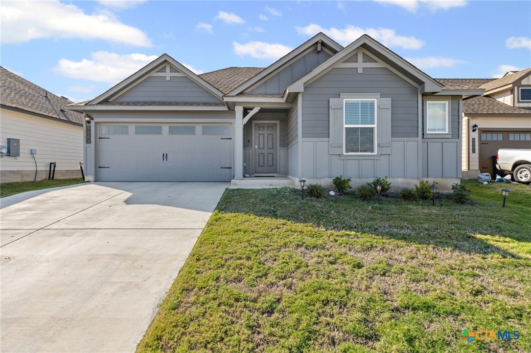 7203 Gilbert Drive Killeen, TX 76549 - Photo 2 of 16 a front view of a house with garden