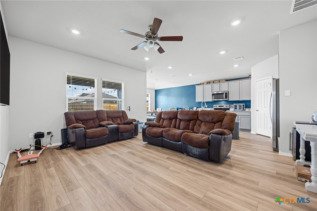 7203 Gilbert Drive Killeen, TX 76549 - Photo 7 of 16 a living room with furniture and a wooden floor