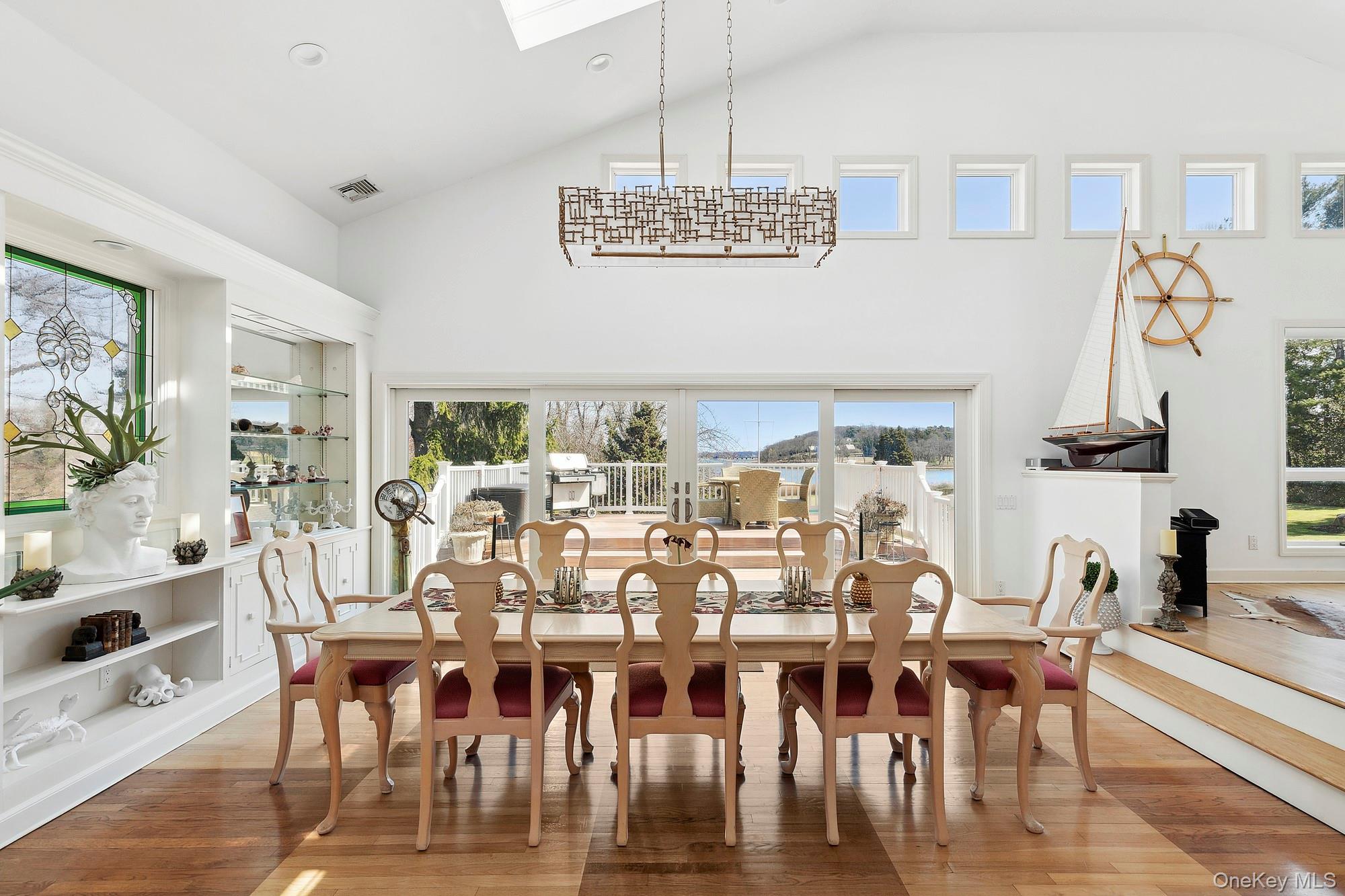 61 Factory Pond Road Locust Valley, NY 11560 - Photo 15 of 35 a view of a dining room with furniture window and outside view