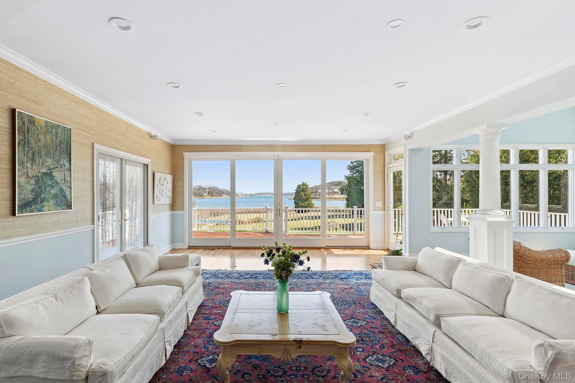 61 Factory Pond Road Locust Valley, NY 11560 - Photo 25 of 35 a living room with furniture and a large window