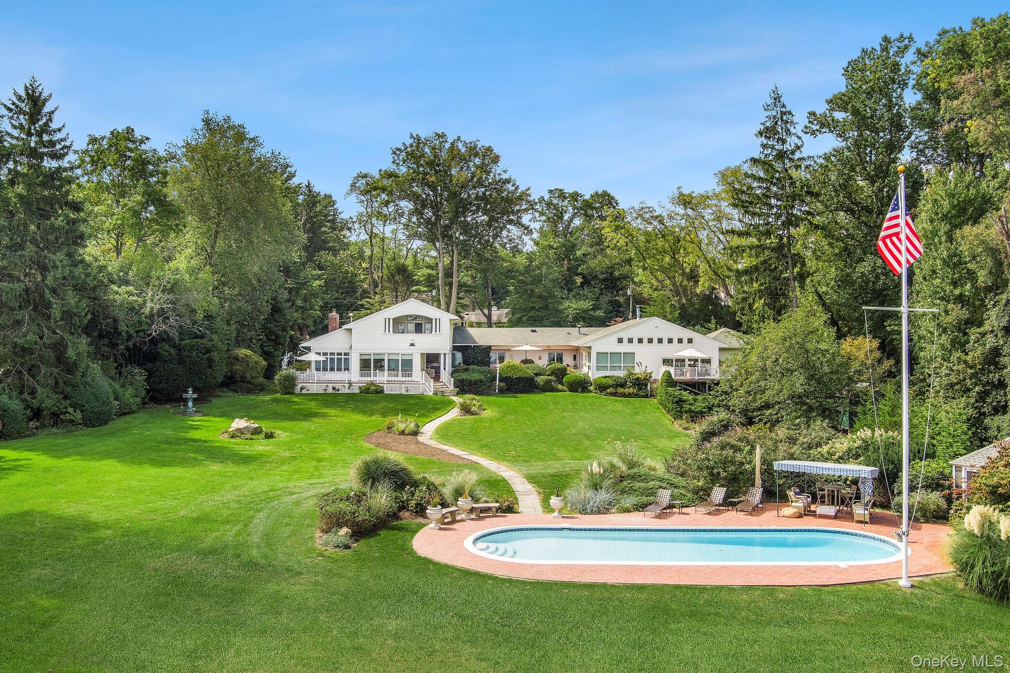 61 Factory Pond Road Locust Valley, NY 11560 - Photo 34 of 35 a garden view with a seating space and garden