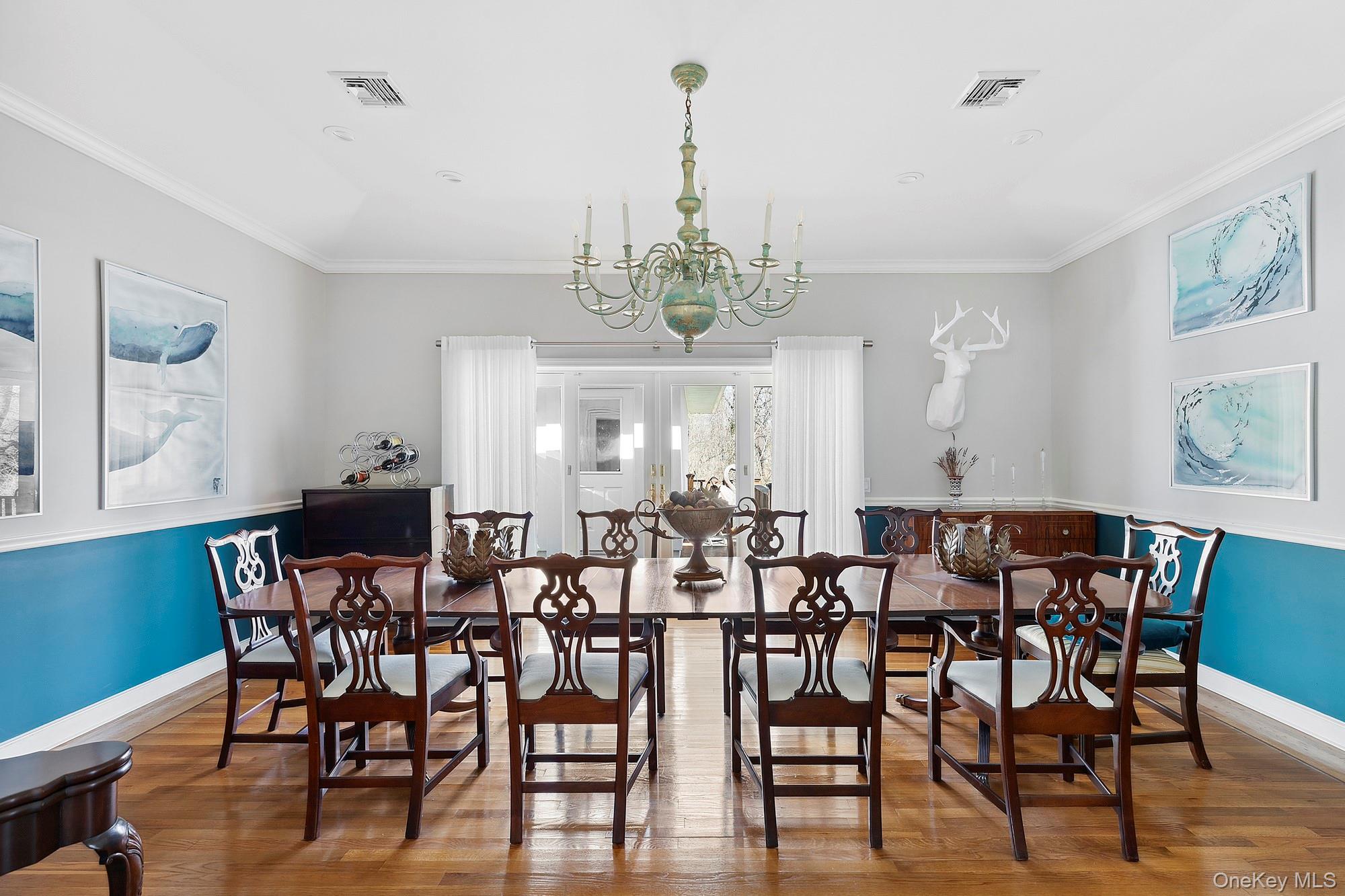 61 Factory Pond Road Locust Valley, NY 11560 - Photo 8 of 35 a view of a dining room with furniture window and wooden floor