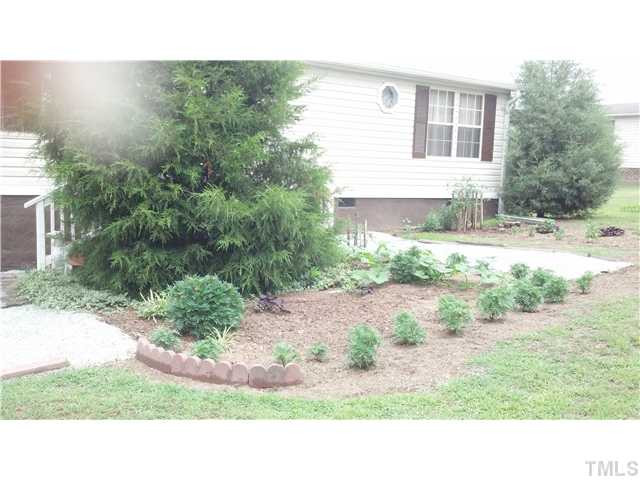 561 George Sherman Road Rougemont, NC 27572 - Photo 20 of 24 One of many lovely gardens.