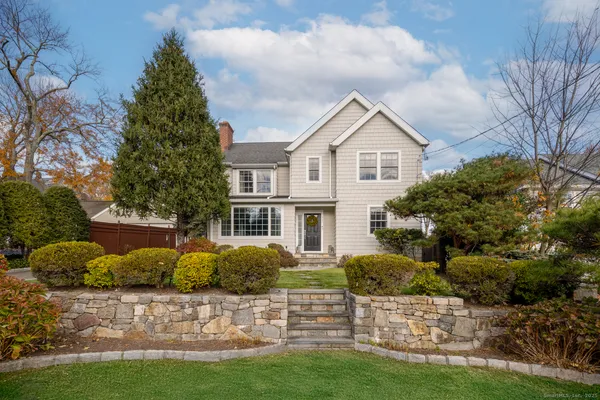 a house view with a garden space