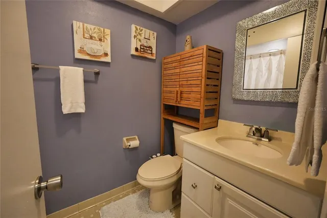 a bathroom with a sink and a toilet