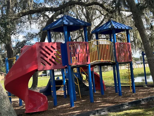 a view of a cafe with outdoor seating