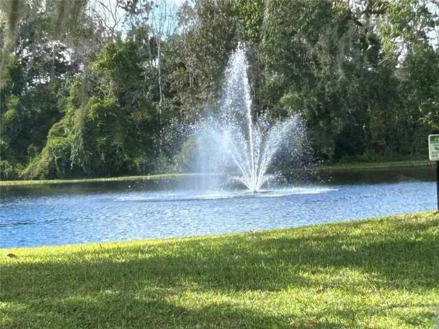 a view of outdoor space with deck and yard