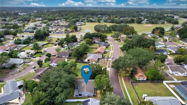an aerial view of a city with lots of residential buildings