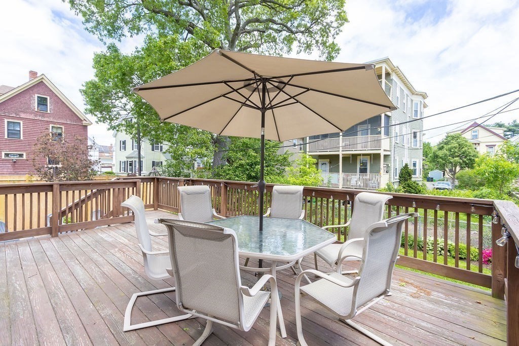 43 Sheffield Road, Unit 2 Boston, MA 02131 - Photo 13 of 16 a view of a chair and table on the deck