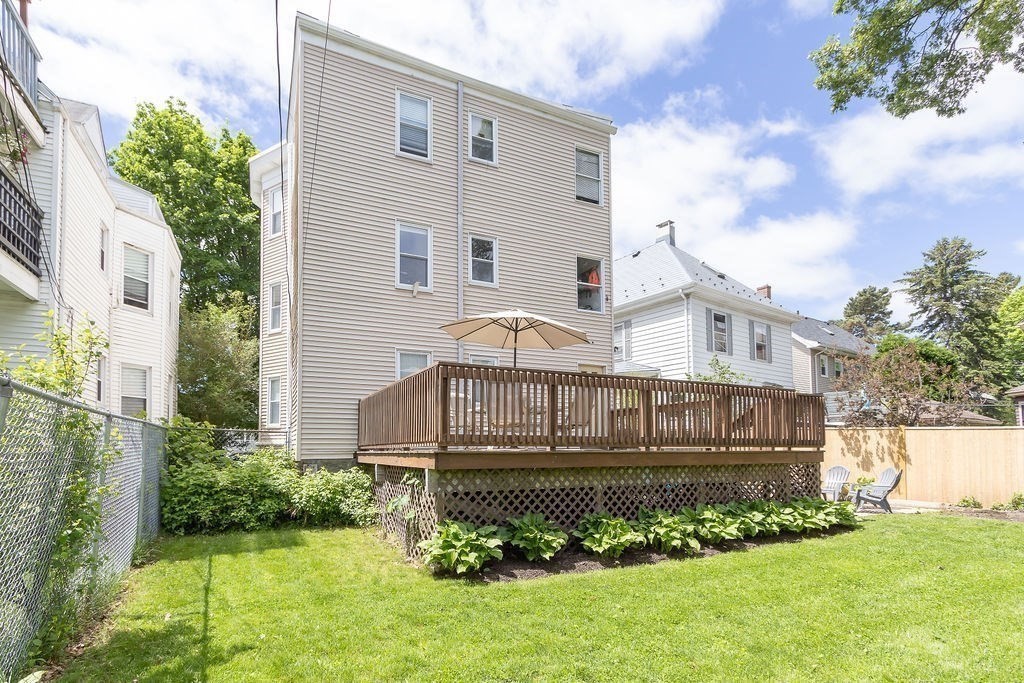 43 Sheffield Road, Unit 2 Boston, MA 02131 - Photo 14 of 16 a view of a house with a yard