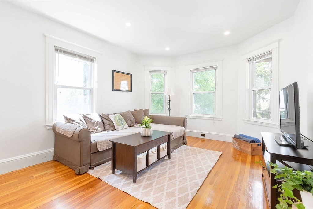 43 Sheffield Road, Unit 2 Boston, MA 02131 - Photo 5 of 16 a living room with furniture and a flat screen tv