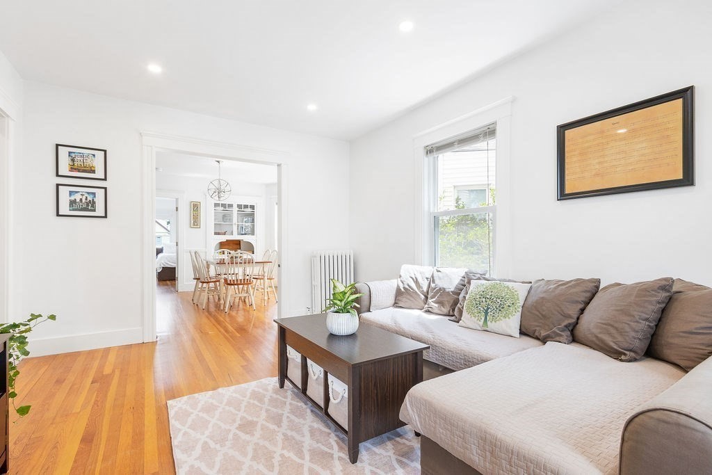 43 Sheffield Road, Unit 2 Boston, MA 02131 - Photo 6 of 16 a living room with furniture and a flat screen tv