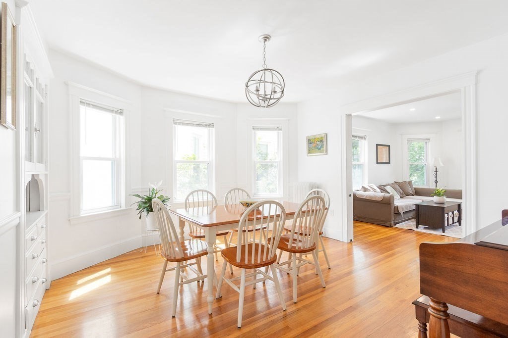 43 Sheffield Road, Unit 2 Boston, MA 02131 - Photo 7 of 16 a view of a dining room with furniture window and wooden floor