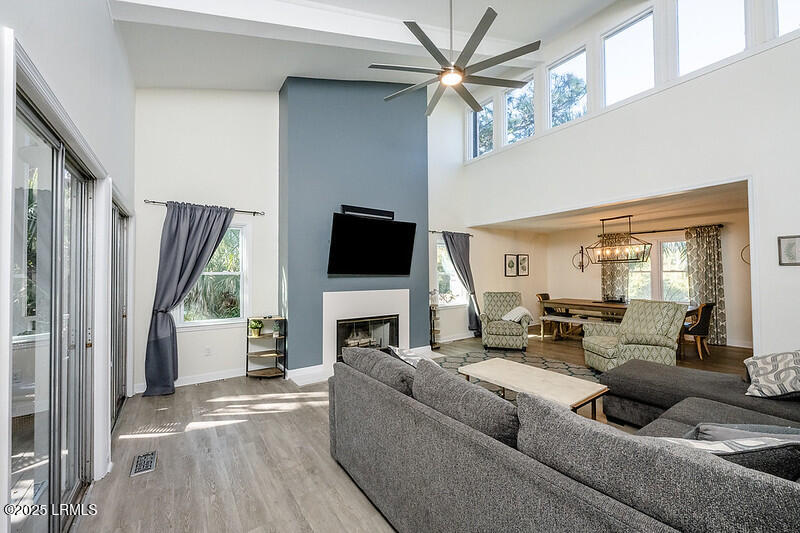 621 Dolphin Road Fripp Island, SC 29920 - Photo 15 of 35 Open Family Room w/ Fireplace & Dining