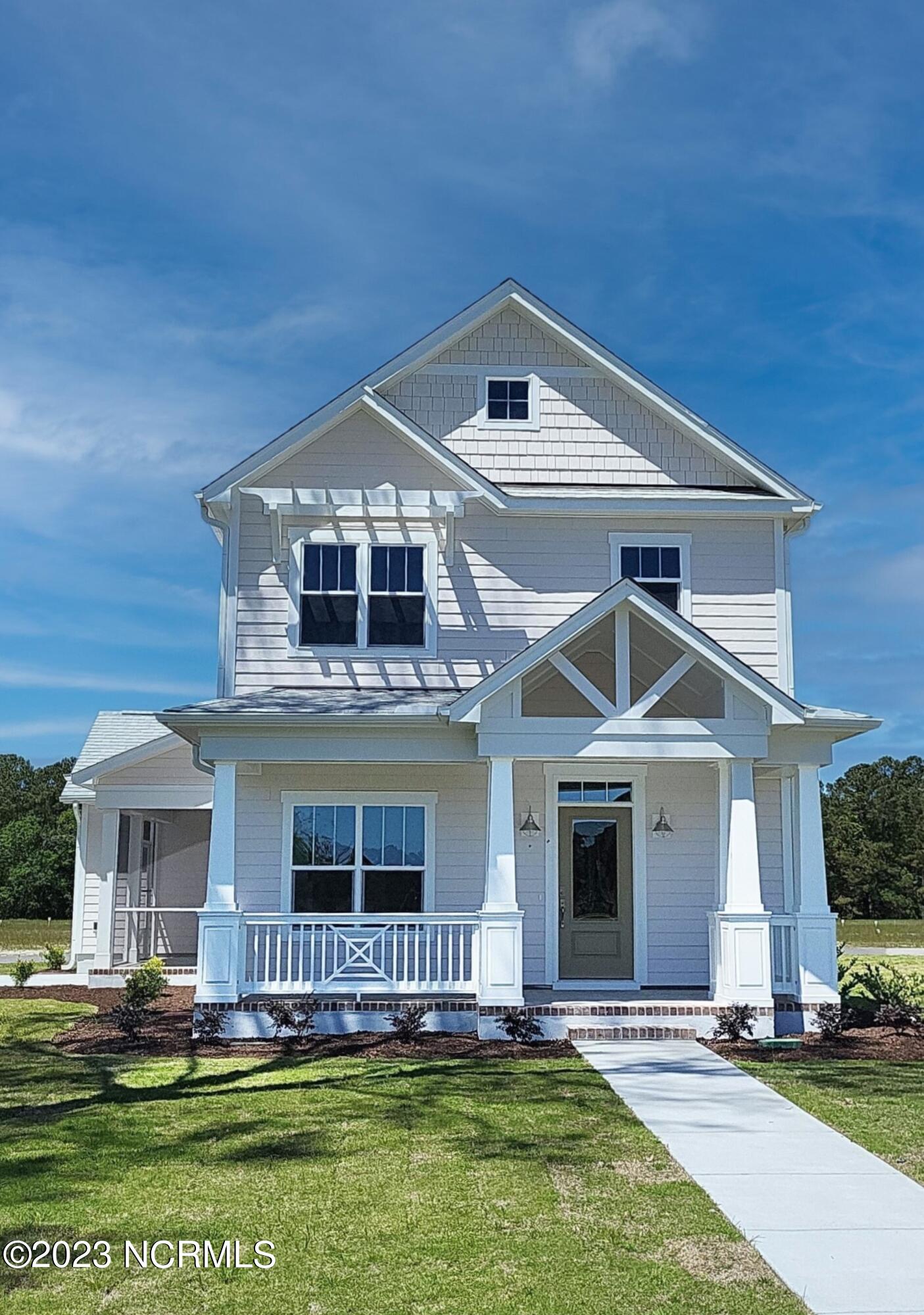 1573 Moray Loop Sunset Beach, NC 28468 - Photo 5 of 5 Front of House