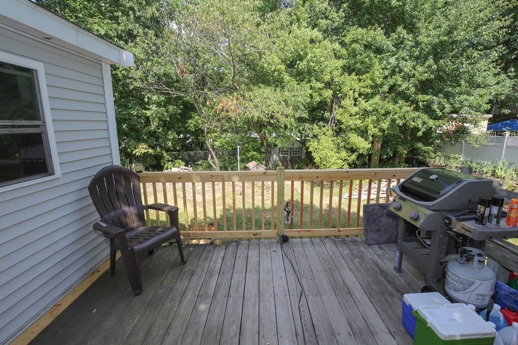 49 Rabbit Road Salisbury, MA 01952 - Photo 18 of 29 a balcony with wooden floor table and chairs