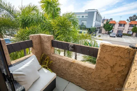 a view of balcony with furniture