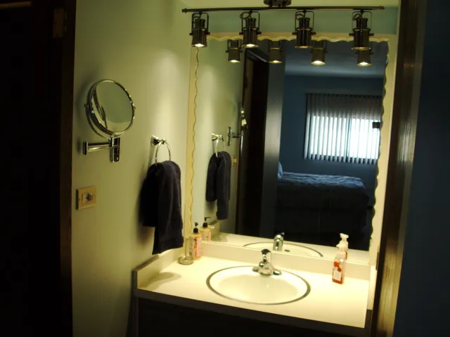 a bathroom with a sink and a mirror