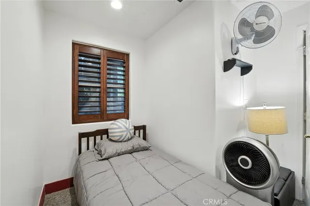 a view of a bathroom with a sink and mirror