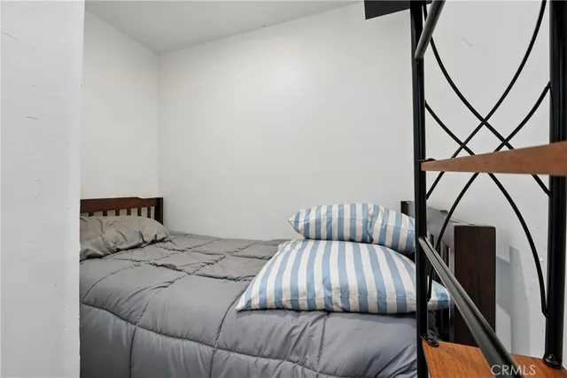 a kitchen with stainless steel appliances granite countertop a sink and a refrigerator