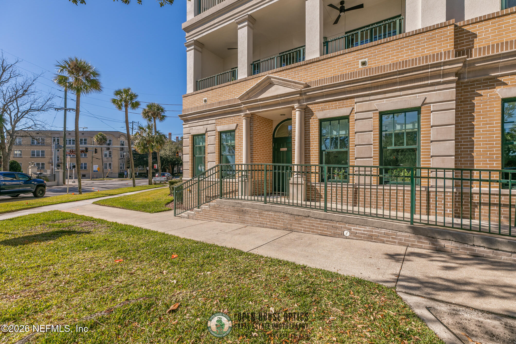 1661 Riverside Avenue, Unit 407 Jacksonville, FL 32204 - Photo 29 of 60 a view of a house with a swimming pool and a patio