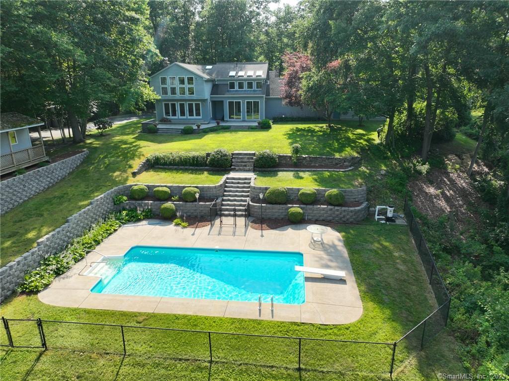 21 Lt Shubael Road Haddam, CT 06441 - Photo 1 of 1 a view of a swimming pool with a garden