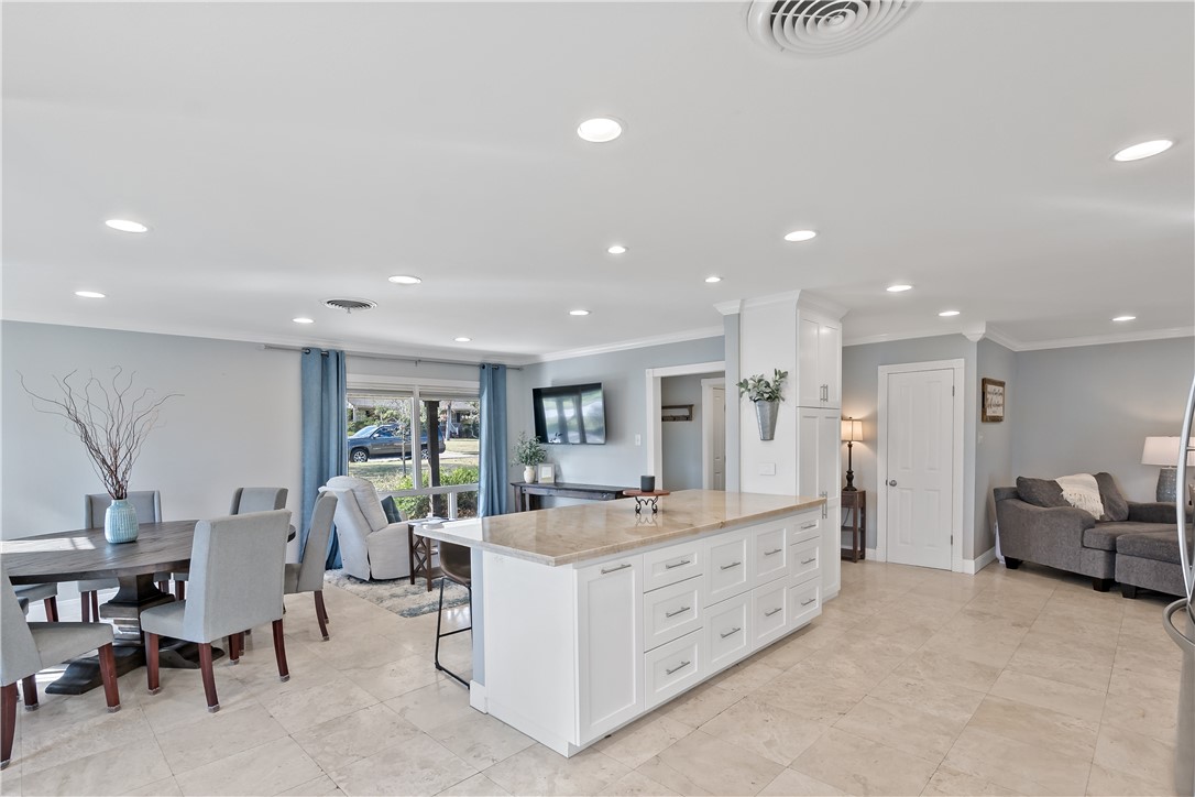 507 Crescent Drive Bryan, TX 77801 - Photo 17 of 41 a large room with a large window and furniture