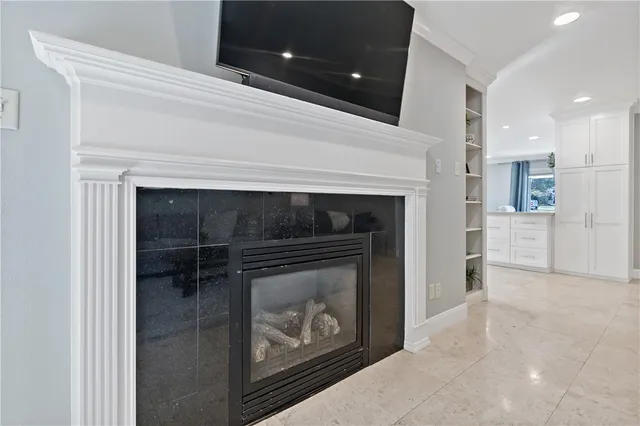 a living room with a fireplace