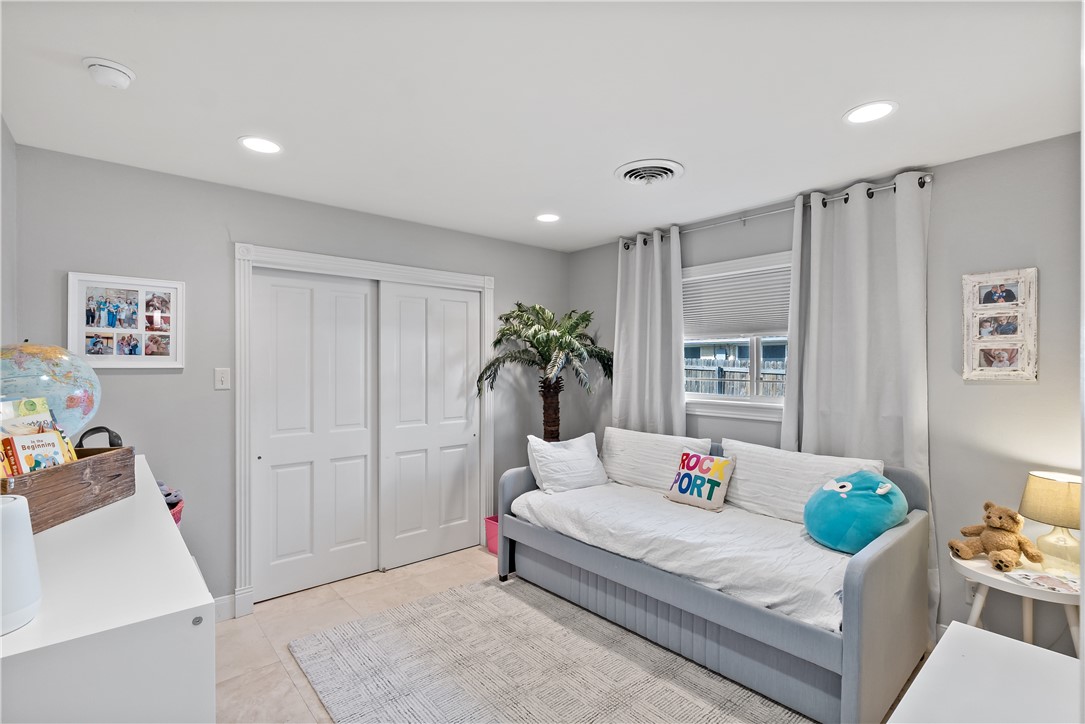 507 Crescent Drive Bryan, TX 77801 - Photo 25 of 41 a bedroom with a bed and a window