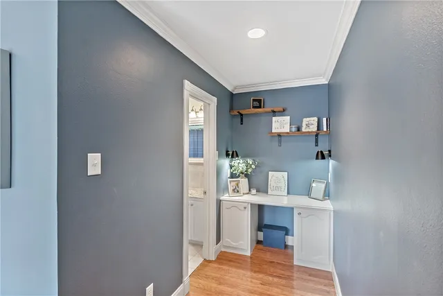 a bedroom with a bed and a view of bathroom