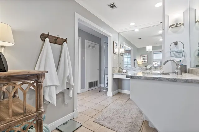 a view of a kitchen with a sink and cabinets