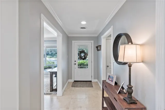 a view of a livingroom with furniture and a window