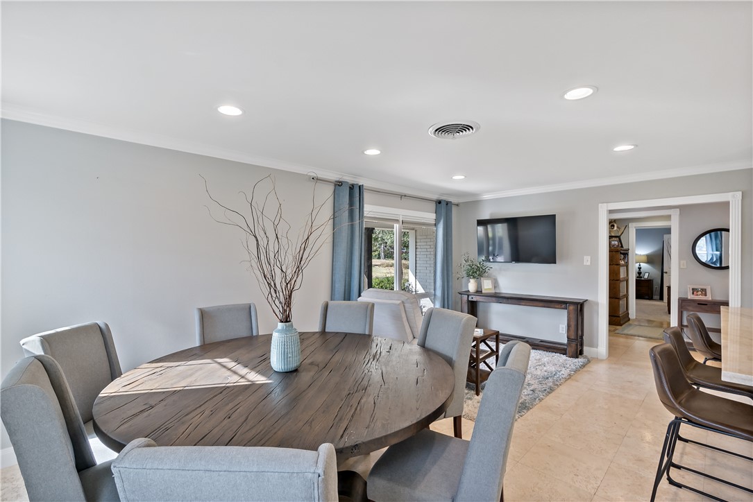 507 Crescent Drive Bryan, TX 77801 - Photo 9 of 41 a living room with furniture and a flat screen tv