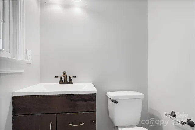 a bathroom with a sink and a toilet