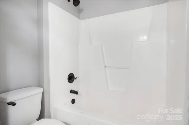 a bathroom with a toilet