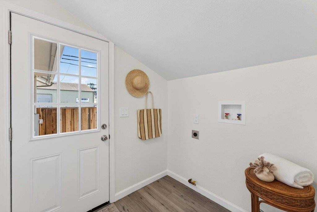 152 Grove Street Watsonville, CA 95076 - Photo 18 of 35 a view of a room that has a bed and a window in it