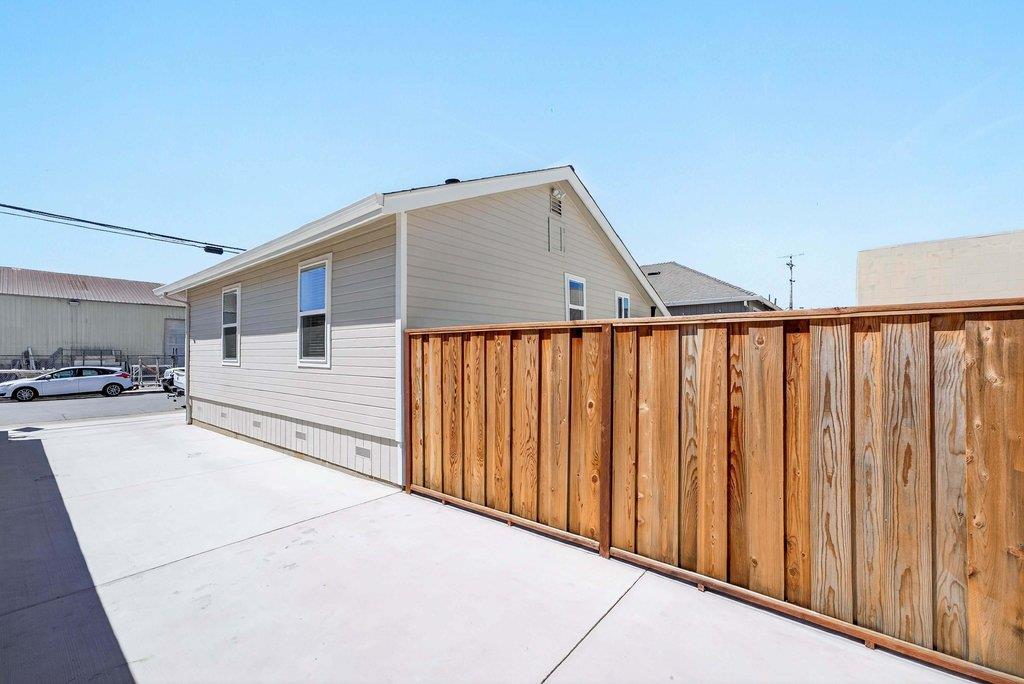 152 Grove Street Watsonville, CA 95076 - Photo 33 of 35 a view of a house with a backyard