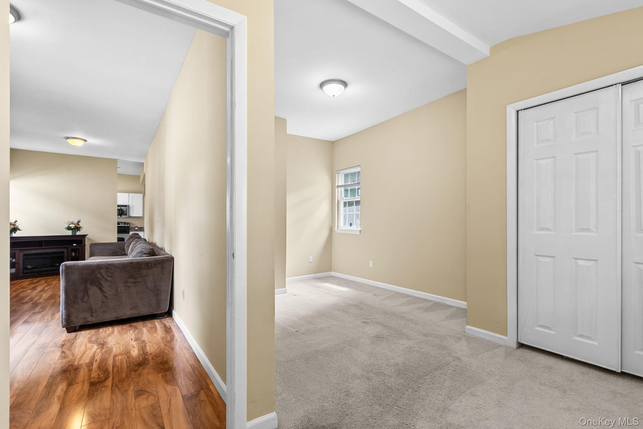 10 Batavia Road Patterson, NY 12563 - Photo 9 of 42 Neutral-toned walls and light-colored carpeting define this bedroom. Built-in closet and previously accomodated a Queen size bedroom set.